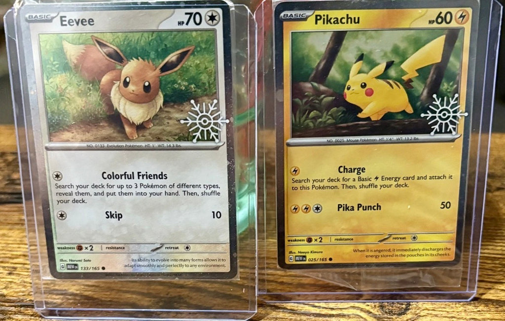 Pokémon 151 Holiday Calendar — Pikachu 025/165 & Eevee 133/165 Snowflake Promo